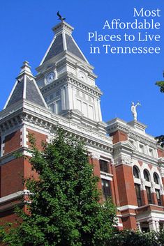 a tall building with a clock on it's face and the words most important places to live in tennessee