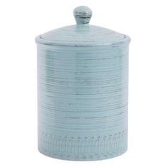 a light blue canister with a lid on it's side and a white background