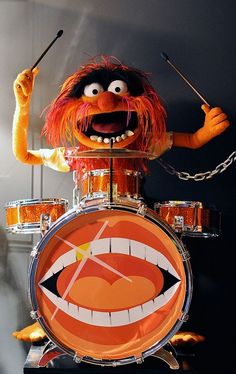 the muppet drummer is happy friday everyone