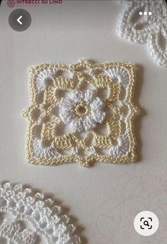 two crocheted doily are shown on a white surface with the same pattern