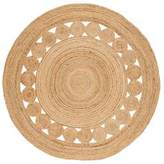 the round rug is made out of jute and has an intricate design on it