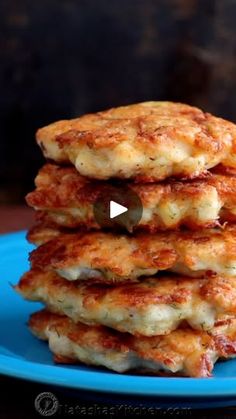 a stack of pancakes on a blue plate with a video playing in front of it