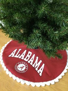 a tree skirt with the word alabama on it