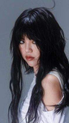 a woman with long black hair wearing a white shirt