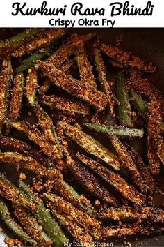 fried green beans in a pan with seasoning