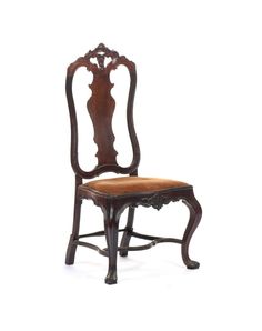 an old wooden chair with a brown seat and back cushion on the seat, against a white background