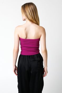 You'll be looking super chic when you head out in the Becca Magenta Twist Knot Tube Top! Magenta ribbed knit shapes this twist knotted tube top that has a sweetheart neckline, and a cropped bodice. Style with distressed jeans and booties for a fun look! DETAILS & FIT Fit Fit Type: Regular Length: Crop Neckline: Strapless Fabric Composition: 45% Rayon, 55% nylon Stretch: Stretchy Knit Fabric Material: Ribbed Knit Fabric Design Occasion: College Outfits/ Music Festival/Date Night/Brunch/Vacation/B Chic Seamless Bandeau Top, Seamless Cropped Tube Top For Night Out, Chic Seamless Tube Top For Spring, Chic Strapless Seamless Crop Top, Chic Seamless Bandeau Crop Top, Casual Bandeau Top For Date Night, Spring Ribbed Bandeau Crop Top, Trendy Ribbed Bandeau Crop Top, Trendy Bandeau Tops For Date Night