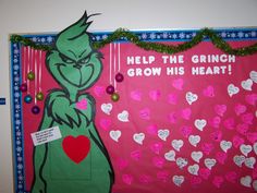 a bulletin board with an image of the grinch holding a heart and saying help the grinch grow his heart