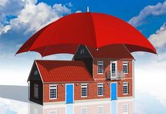 a house with an umbrella over it to protect it from the sun's rays