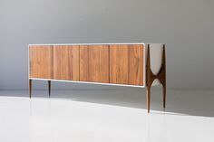 the sideboard is made out of wood and white