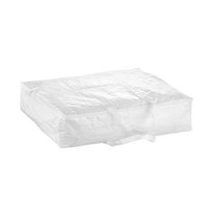 a large white plastic bag sitting on top of a table