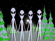 an alien family standing in front of christmas trees