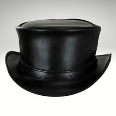 Mens Black Leather Top Hat - Made with genuine leather.  We presents the sleek and streamlined Black Leather Top Hat for those who prefer a simpler design.  Cowhide suede, a narrow self-leather Black Leather Top Hat strap adorns the short pointed crown.  This leather item is handmade with cowhide leather and is from expert craftsmen.  This is a stylish and durable item. Our products are of the highest quality. We guarantee satisfaction. Black Fitted Leather Hat, Fitted Black Leather Hat, Classic Leather Hat With Flat Bill, Leather Hat With Flat Brim For Formal Occasions, Black Leather Hat With High Crown, Formal Leather Hat With Flat Brim, Elegant Leather Hats With Flat Crown, Elegant Leather Hat With Short Brim, Classic Leather Flat Bill Hat