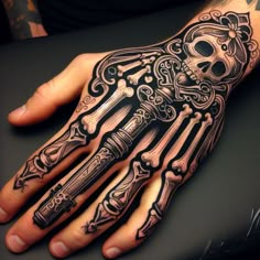 a hand with a skeleton and cross tattoo on it