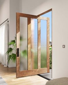 an open wooden door with frosted glass on the inside and outside doors, in front of a white wall