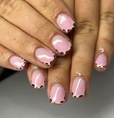 This nail design is perfect for anyone looking to add a little wildness to their summer French manicure. The subtle pink base with delicate leopard print tips offers a chic yet playful look. The leopard print is not only trendy but also incredibly easy to recreate at home.   Photo credit by: @nailsbyhanmcr Easy Biab Nail Designs, Leopard Print Tip Nails, French Tips With Nail Art, Pink Leopard Print Nails Acrylic, Short Leopard Print Nails, August Nails Ideas 2024