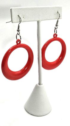 Big red dangling hoop statement earrings right out of the 80's. They are hooked for pierced ears and measure over 2.75" from the top of the hook and 1.5" across. Rad! Expedited shipping is available by request on a case by case basis. Please message us if you require rush shipping. Returns are are accepted within the time window noted. To recieve a full refund the return must meet one of the following criteria. All other returns are subject to restocking fees. 1. Item was late or not delivered 2 80s Memories, 1980s Jewelry, 80s Earrings, Red Power, Chandler Az, 1980s Fashion, The 80's, Etsy Earrings Dangle, Pierced Ears