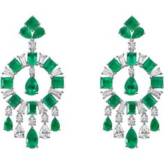 Unveil the beauty of eternal love with the mesmerizing allure of the Love And Commitment Belcanto Chandelier Earrings by Ruchi New York. Crafted to capture the essence of romance, these exquisite earrings boast a captivating ensemble of mixed shape Colombian emeralds and diamonds, promising to adorn any occasion with grace and sophistication. With a total weight of 5.11 carats of diamonds and 12.57 carats of Colombian emeralds, these earrings exude luxury and refinement.Part of Ruchi New York's esteemed High Jewelry collection, the Love & Commitment line epitomizes the essence of enduring love and devotion. Each piece in this collection is meticulously crafted to honor the sacred bonds of love, symbolizing milestones and cherished memories. From dazzling engagement rings to vibrant anniver Luxury Fusion Style Earrings, Luxury Festive Fusion Chandelier Earrings, Luxury Green Chandelier Earrings, Luxury Green Bridal Earrings, Luxury Green Chandelier Earrings For Wedding, Luxury Emerald Earrings For Wedding, Luxury Emerald Wedding Earrings, Diamond Chandelier Earrings, Diamond Chandelier