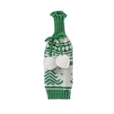 a green and white knitted wine bottle with pom - poms on it