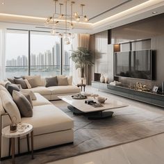 a living room filled with furniture and a flat screen tv on top of a wall