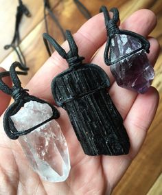 "Crystal necklace w/ 22\" black cord - Amethyst, Quartz, Black Tourmaline, Lepidolite, Garnet, Selenite & Emerald - Raw Crystals and Stones Listing includes: One Stone (selenite, selenite w/ 7 stones, amethyst, quartz, emerald, garnet, lepidolite, smoky quartz, or Black tourmaline) with 22\" cord. Look through all 5 photos to see the color and quality Stone size is between 1\" to 2\". These are STOCK PHOTOS. Because they are natural stones, will vary in size and characteristics. Made with lo Crystal Girl, Jewelry By Brand, Grunge Jewelry, Raw Crystals, Raw Crystal Necklace, Witchy Stuff, Tourmaline Pendant, Meditation Crystals, Amethyst Quartz