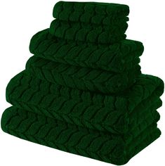 four green towels stacked on top of each other