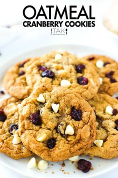 A white plate of six cookies with some white chocolate chips and cranberries scattered around the cookies. Oatmeal White Chocolate Cranberry, Cranberry Cookie, Cookies With White Chocolate Chips, Cookies With White Chocolate, Oatmeal Cranberry Cookies, Favorite Cookie Recipe