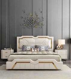 a bedroom with grey walls and white furniture in the center is a bed that has gold trimmings on the headboard