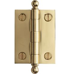 a brass plated door hinge with two knobs