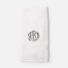 the monogrammed towel is white with black lettering