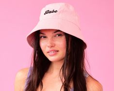 "💖Soak Up the Sun: we hope you're ready to become the coolest poolside babe around with our star-of-the-show white Babe hat! Featuring a bucket hat fit + black embroidered \"Babe\", there's not a moment this hat isn't ready for! 💖Helllllo, fit!: this bucket hat has a super relxed fit and a 22\" diameter 💖Perfect Pair: our Babe sun hat is guaranteed to match whatever beach bum outfit you decide to pair with it - whether that be a casual cover-up, delicate crochet dress, or those 6\" high heels Bachelorette Party Decorations Pink, Pink Bachelorette Party Decorations, Bum Outfit, Beach Bum Outfit, Party Decorations Pink, Ultimate Bachelorette Party, Bucket Hat Fits, Hats Black, Show White