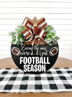 a football themed centerpiece on top of a table