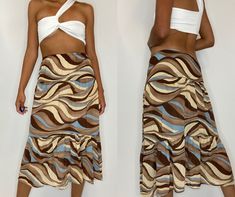 Vintage y2k skirt -- can be worn as a low or high waist. No tag. Measurements: Waist: 25" - 36" Hip: 44" Length: 31" In good vintage condition. Y2k Rock, Y2k Skirt, Skirt Medium, Brown And Blue, Womens Skirts, Print Skirt, Low Waist, Printed Skirts, Geometric Print