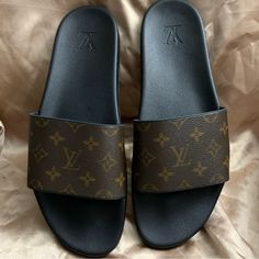 Excellent Condition For These Lv Slides. Iconic Brown Monogram. Size Is Lv 12(See Measurements For Exact Fit. Coa Will Ship With Purchase Lv Sandals, Lv Slides, Louis Vuitton Slides, Brown Slides, Louis Vuitton Brown, Louis Vuitton Shoes, Pool Slides, Flip Flop Sandals, Shoes Sandals