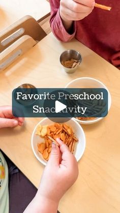 two children sitting at a table eating food with the words favorite preschool snack activity