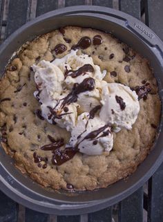 a chocolate chip cookie with ice cream on top