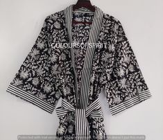 "These cotton floral Print Robes are luxurious and sweet robes , and will make you and your bridesmaids feel like you're blossoming flowers and unique print ! This Robe we makes from 100% Cotton printed fabric . The fabric print is Floral Print which is very popular in all over the world . These robes are perfect for bridesmaids gifts, birthday gifts, and perfect gifts for girls who are in college. A beautiful lightweight cotton kimono-style hand-printed dressing gown. The gown is 100 cms / 39 \" inch length and 120 cms / 47 inch \" wide / bust approx. Features two front pockets, belt and loops . This soft cotton fabric is from India. Fabric has soft touch . Measurements : ( 1 ) ADULT SIZE : Approx Bust : 120 CM / 47 INCH Approx Length : 100 CM / 39 INCH 2 POCKET Fabric : Cotton fabric Col Elegant Spring Cotton Kimono, Black Cotton Kimono For Summer, Elegant Spring Cotton Robe, Spring Cotton Robe With Floral Print, Bohemian Cotton Robe With Floral Print, Bohemian Cotton Floral Print Robe, Elegant Cotton Kimono, Traditional Cotton Robe With Kimono Sleeves, Spring Cotton Robe With Kimono Sleeves