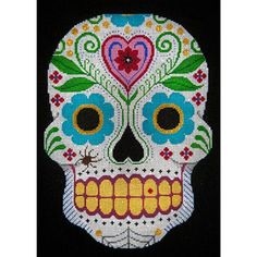 a cross stitch sugar skull with colorful flowers on it's face and eyes,