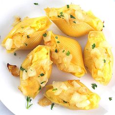 some kind of stuffed shells on a white plate