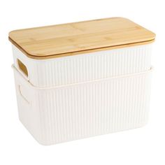 a large white container with a wooden lid