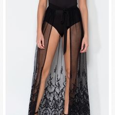 Gorgeous Sheer Black Skirt That Ties Around The Waist. Bodysuit Bottom Does Not Come With It, Just The Skirt. Never Worn Before (Could Never Find A Bodysuit I Liked) Chic Black Lace Bottoms, Black Sheer Party Bottoms, Lace Long Skirt For Beach, Summer Evening Lace Skirt, High Waist Sheer Skirt For Summer, Black Sheer Flowy Skirt, Sheer Skirt For Night Out, Lace Flowy Skirt For The Beach, Chic Black Sheer Skirt