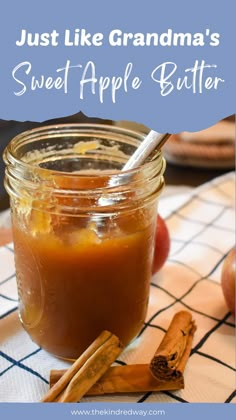 just like grandma's sweet apple butter in a jar with cinnamon sticks and an apple next to it