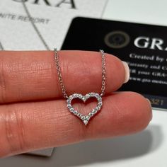 New Sterling Silver And Moissonite Heart Shaped Pendant Necklace 20x 0.015 Carat Diamond Cut Stones. 0.3 Total Carat Weight. Gra Certified. Diamond Test Positive. Pendant Size: 13mm X 12mm Chain Length: 17.6" - 19.6" Comes With Gift Box. White Heart-shaped Diamond Necklace For Formal Occasions, White Heart-shaped Diamond Necklace For Formal Events, White Heart Diamond Necklace For Formal Occasions, White Sterling Silver Heart Necklace With Brilliant Cut, White Heart Shaped Diamond Necklace In Fine Jewelry, White Diamond Open Heart Necklace, White Open Heart Brilliant Cut Necklace, Brilliant Cut White Diamond Open Heart Necklace, White Brilliant Cut Open Heart Necklace