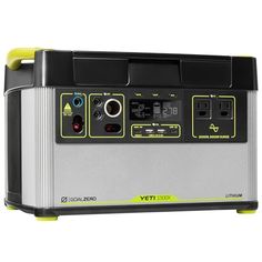 the portable generator is on display with its yellow trimmings and black top,