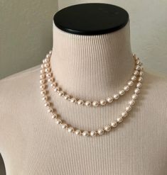 Vintage single strand of pearls is 36 inches in length.. ... but is versatile and can easily be worn as a double strand as seen in the pictures. The pearls are a creamy white hue. The clasp is a shepherd's hook style. Great classic piece of costume jewelry. The pearls are in lovely vintage condition! 1960s Jewelry Vintage, Vintage Royal Jewelry, 50s Necklace, 1930s Jewelry, Business Fits, Vintage Pearl Jewelry, 60s Jewelry, Alien Halloween, Vintage Pearl Necklace