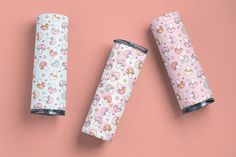 three different types of pink and white paper with unicorns on them, one is rolled up