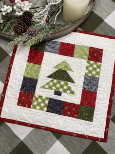 a quilted christmas tree on top of a table with the words instagramn above it