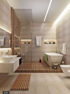 a bathroom with two sinks, a bathtub and a stand up shower in it