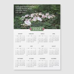 a calendar with flowers on it and the date for each month in green, pink and white