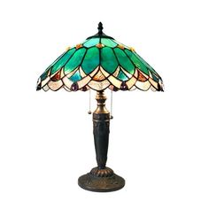 a table lamp with a green and gold shade on it's base, against a white background